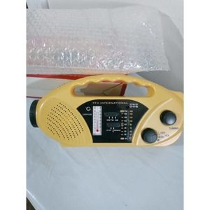 FFH International Self Powered AM/FM Radio Solar & Crank Solar Yellow NIB